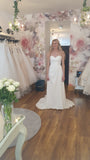 Off the peg crepe bridal gown with side slit